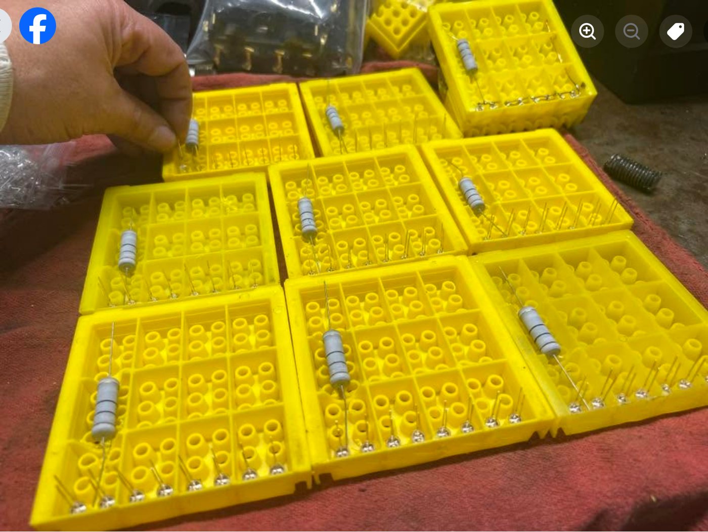 Underside of several racks showing resistors, wiring and LED leads